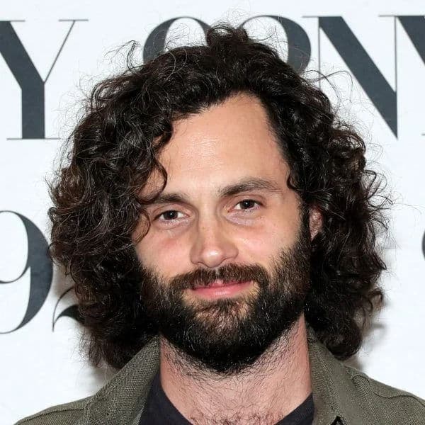 Medium-Length Curly Shag hairstyle for oval face shape - men's medium curly hair