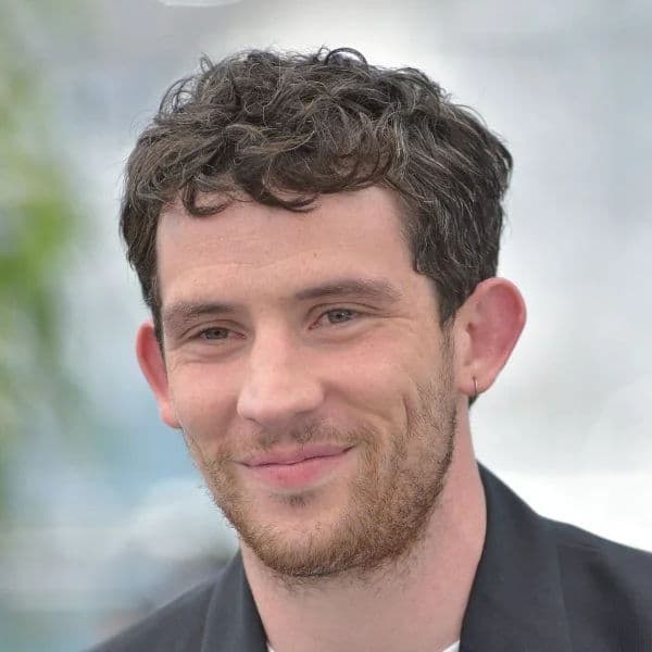 Messy Curly Crop hairstyle for oval face shape - men's short curly hair
