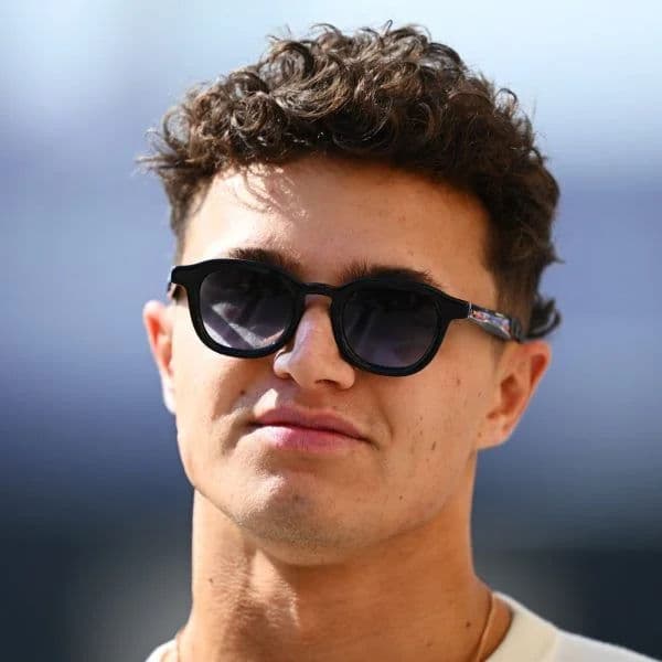 Messy Curly Taper hairstyle for diamond face shape - men's short curly hair