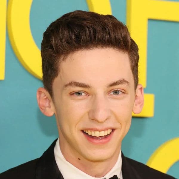 Modern Short Quiff hairstyle for oval face shape - men's short wavy hair