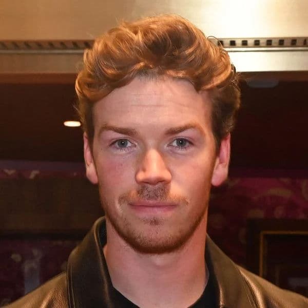 Modern Wavy Quiff hairstyle for oval face shape - men's medium wavy hair