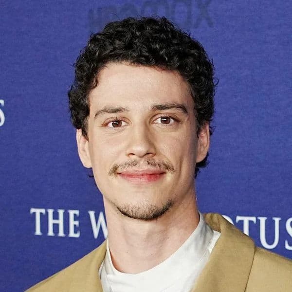 Short Curly Taper hairstyle for oval face shape - men's short curly hair