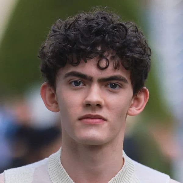 Short Curly Textured Crop hairstyle for oval face shape - men's short curly hair