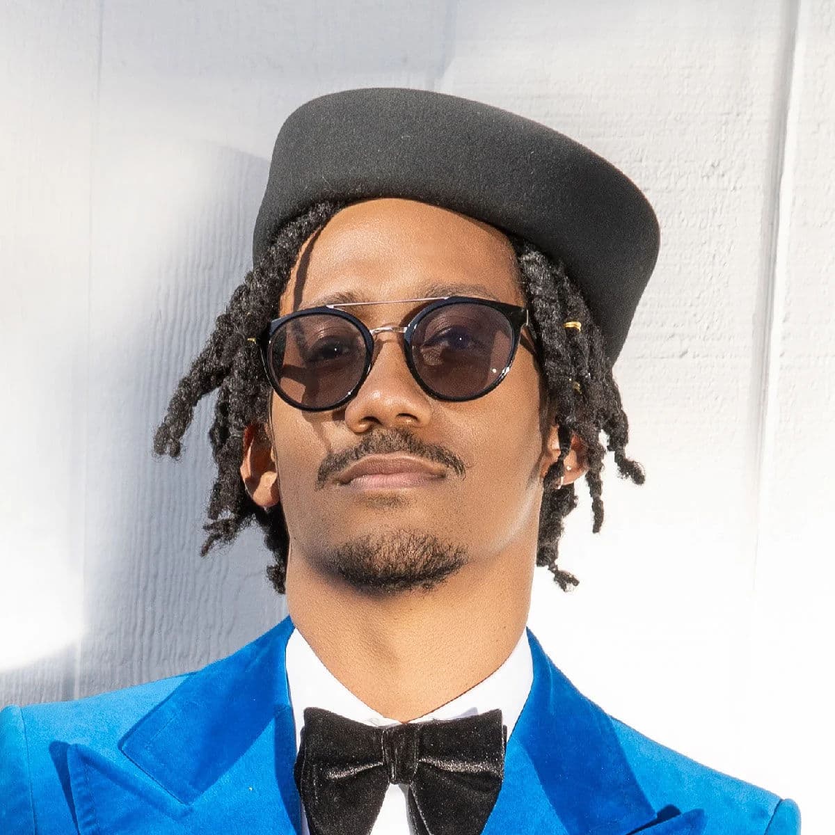 Short Dreadlock Twists hairstyle for oval face shape - men's short coily hair