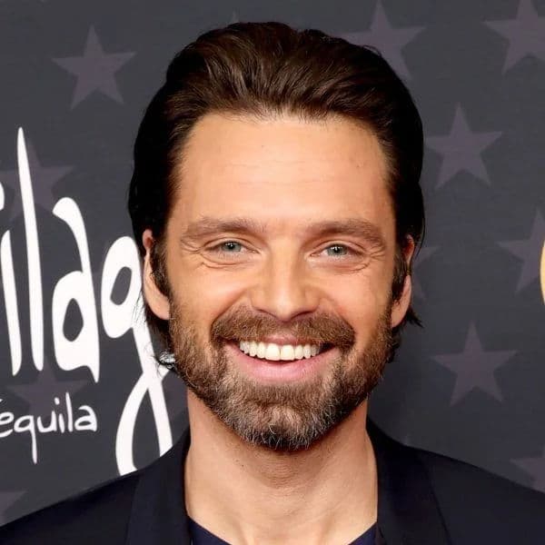 Slicked Back Flow hairstyle for oval face shape - men's medium straight hair