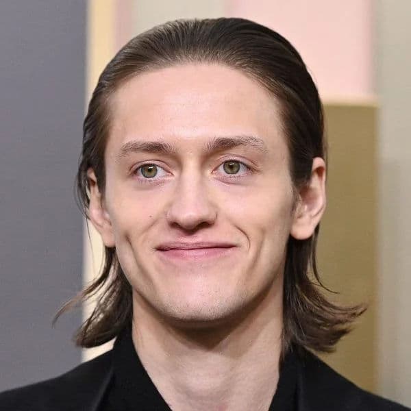 Slicked Back Flow hairstyle for oval face shape - men's medium-long straight hair