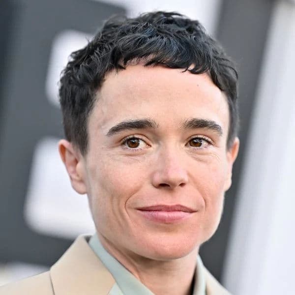 Textured Caesar Crop hairstyle for oval face shape - men's short wavy hair