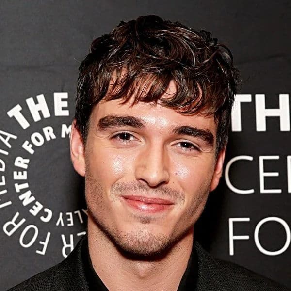 Textured Messy Crop hairstyle for oval face shape - men's short wavy hair