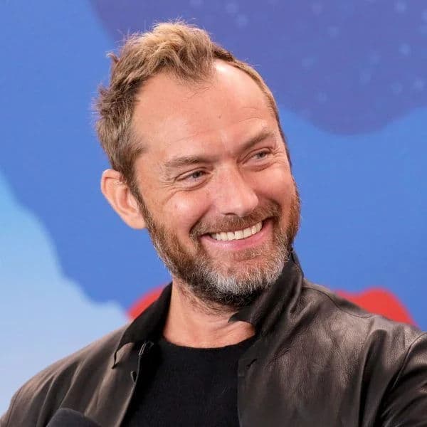 Textured Messy Quiff hairstyle for oval face shape - men's short wavy hair