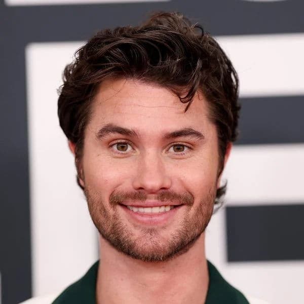 Textured Wavy Quiff hairstyle for oval face shape - men's medium wavy hair