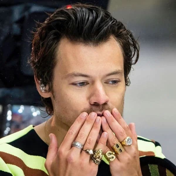 Wavy Swept Back Quiff hairstyle for oval face shape - men's medium wavy hair