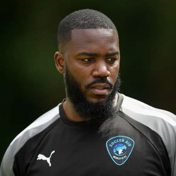 360 Waves with Low Fade hairstyle for oval face shape - men's very-short coily hair