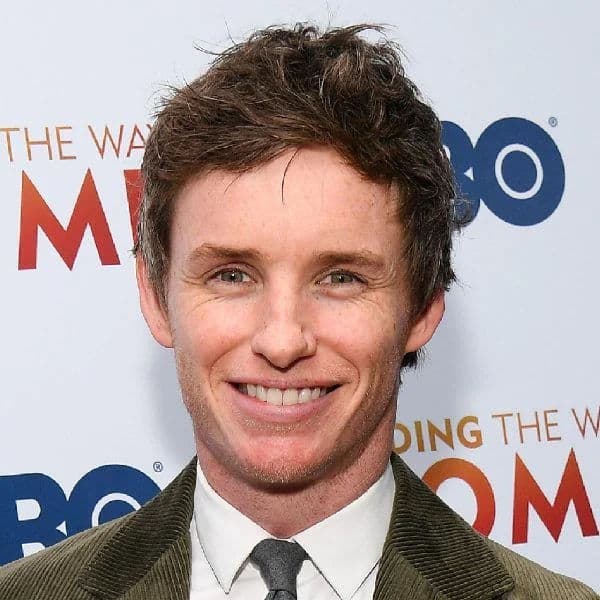 Messy Textured Ivy League hairstyle for diamond face shape - men's short wavy hair