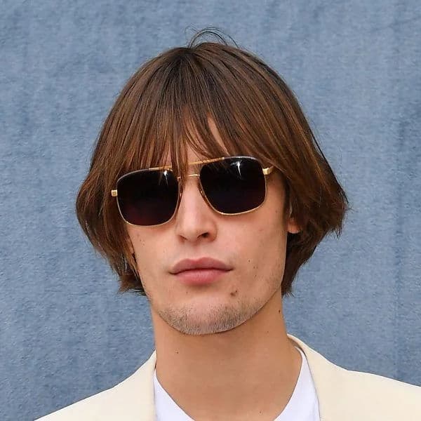 Modern Mod Cut hairstyle for rectangle face shape - men's medium straight hair