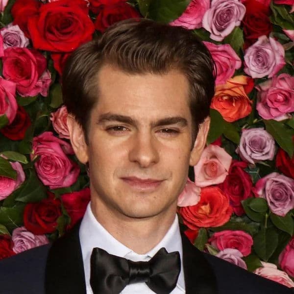 Modern Side-Swept Quiff hairstyle for rectangle face shape - men's short wavy hair