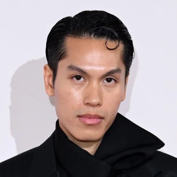 Modern Slick Back with Kiss Curl hairstyle for diamond face shape - men's short straight hair