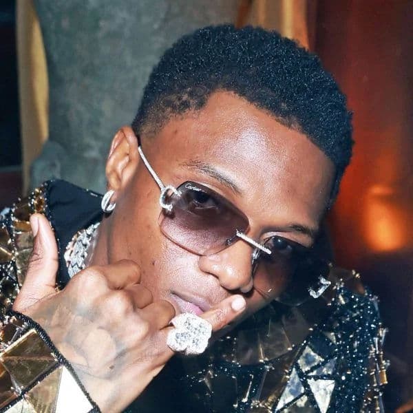 Short Coily Fade with Low Taper hairstyle for oval face shape - men's very-short coily hair