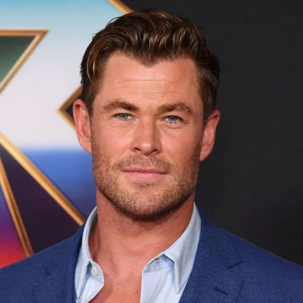 Textured Quiff with Tapered Sides hairstyle for diamond face shape - men's short wavy hair