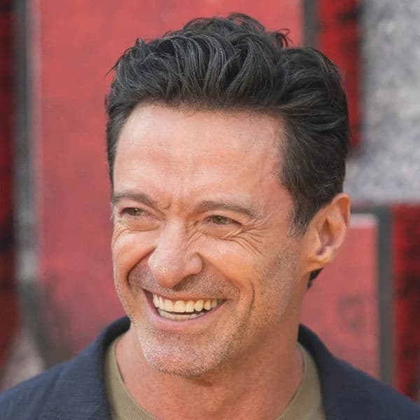 Textured Swept-Back Quiff hairstyle for diamond face shape - men's short wavy hair