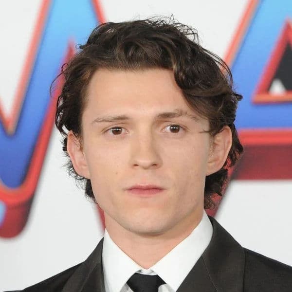 Textured Wavy Quiff hairstyle for rectangle face shape - men's medium wavy hair