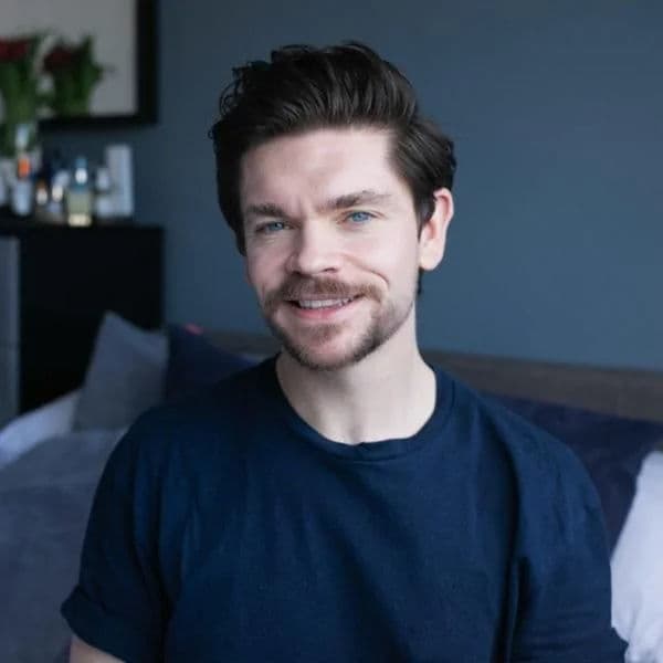 Voluminous Textured Quiff hairstyle for diamond face shape - men's medium wavy hair